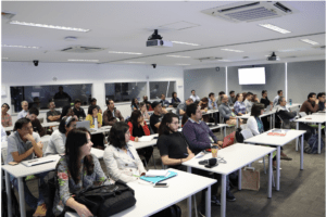 Attendants and speakers during a Immunoinformatics Course session.